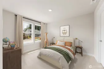 Guest bedroom with walk-in closet and big windows for natural light. Photo of actual home with virtual staging.