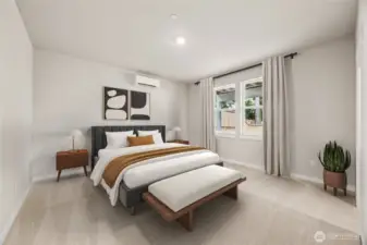 Large bedroom on lower level with large walk-in closet. This guest room can hold a king size mattress, end tables, and accent chair or sofa. Very large for guests. Photo of actual home with virtual staging.