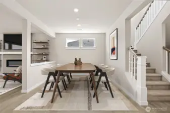 Large dining room area perfect for hosting dinner parties. Photo of actual home with virtual staging.