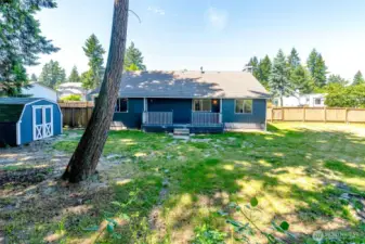 Back yard with Shed and Gate with access.