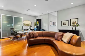 Family room off the kitchen with a sliding privacy door (also has a huge walk-in pantry & media closet!)