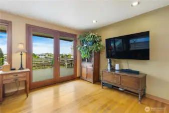 Spacious living area with abundant natural light and serene views.