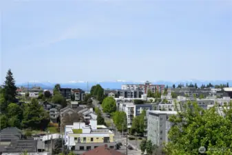 Elevated lot offers unobstructed views of Olympic mountains Puget Sound West seattle town centerand natural privacy.