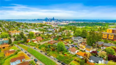 Look what views you have out back of home and from roof top towards everything in Seattle including Cascade mountain range and sunrises in the morning when your live here