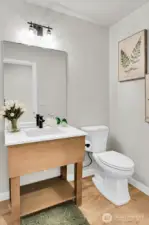 Main floor powder room (easily add a shower for a 3/4 bath)!