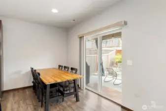 Dining room with sliding door to generous patio space