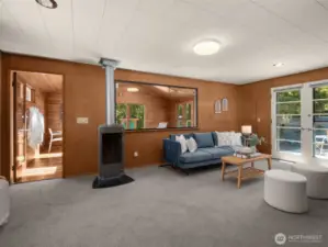 Den with new carpet & gas fireplace