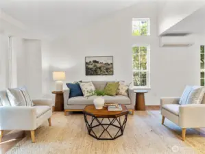 Front living space when you first enter into the home. A/C for the warm days!
