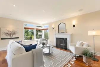 The main floor welcomes you with this gorgeous, formal living room. Note the SE corner windows that flood this floor with natural light.