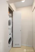 Laundry closet in main floor (opposite from the pantry closet) next to kitchen.