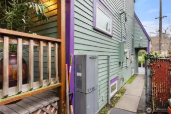 Tankless water heater on north side of home