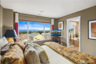 Retreat upstairs to your mountain view primary suite.