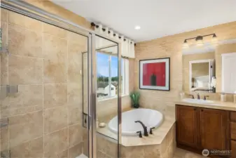 5-piece en-suite primary bath includes a walk-in shower, separate tub, and dual-sink vanity.