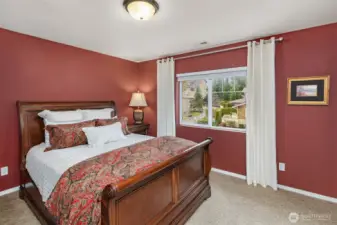 A second bedroom suite is just down the hall from the primary.