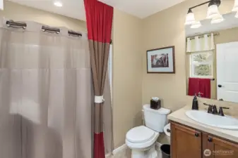 Private full bathroom in the second upstairs bedroom.