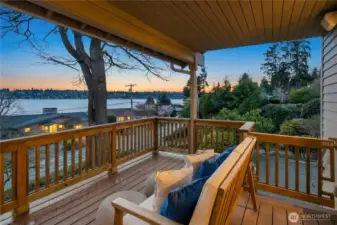 Panoramic Southwesterly views of Lake Washington, Magnuson Park, and stunning sunsets from both levels
