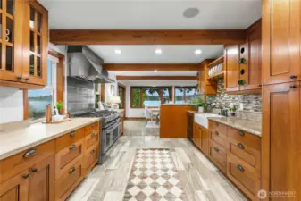 Quality upgrades include chef’s kitchen, oak hardwood floors.