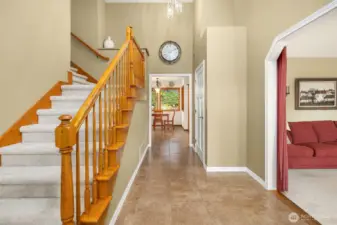 Upon entering, the living room is to the right, kitchen, family room, den and bonus room are straight back