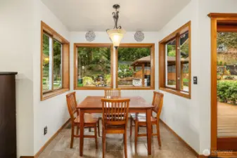 The charming eating nook overlooking the wonderful back yard