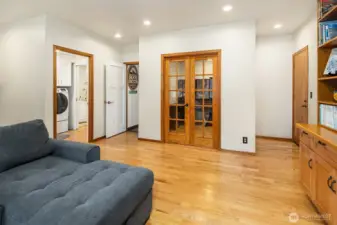 Attached to the family room are the french doors to the den/office.