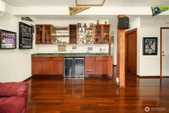 Full wet bar with fridge and room for all your bar needs.