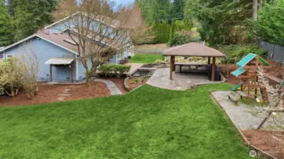 Flat grass area for playing and entertaining.