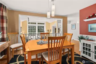 Dining room is conveniently located between the kitchen and formal living room for ease of entertaining