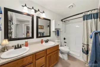 Seoncd Full bath with updated mirrors, lights and fixtures and a step in tub/shower