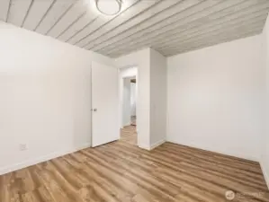 Lower level bedroom 6 without closet doors. 10x13