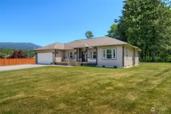Home is situated on 1 acre, with ample yard space.