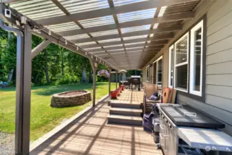 Covered patio and deck spaces off rear of home. Perfect place to entertain friends and family!