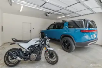 "Right Sized" 22' wide 2-Car Garage features a 240v Level-2 EV charging outlet.