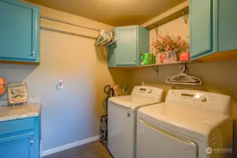 Laundry with custom cabinets