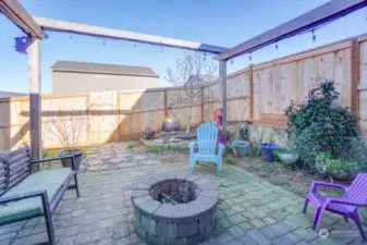 Paver patio with fire pit and pergola