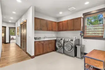 Large and functional utility/mudroom.