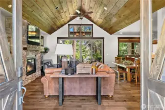 Warm great room with tongue-n-grove ceiling.