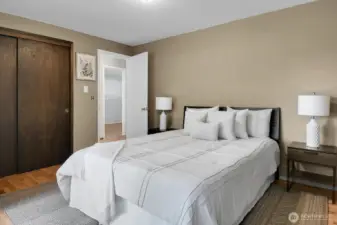 Comfortable primary bedroom.