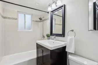 Bright full bathroom.