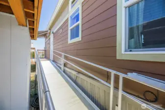 Need to avoid stairs? Here you have an alternative with a safe Ramp w/handrails to assist.