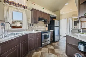 Kitchen w/window and view to front door