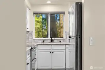 Enjoy a serene view from the large sink.