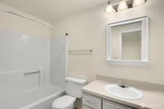 Full bath off 2nd primary bedroom.