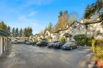 Parking spot 105 and garage 105 is located in front of the unit.