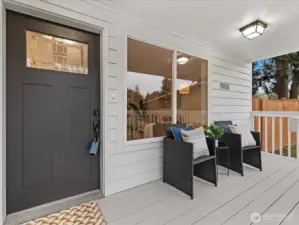 Covered front porch with plenty of space to relax and unwind