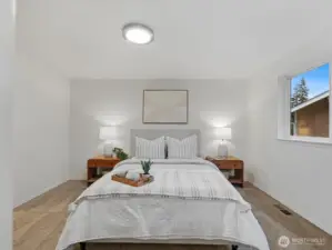 Primary bedroom with plenty of space for any size bed