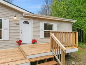 Deck is brand new. Foundation is built last. Stain to color and preserve the brand new deck top will come with the house for buyer to use when the weather turns dry again.