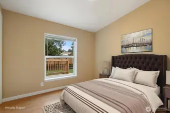 Photo contains virtual staging. Bedroom 2 with walk-in closet