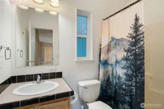 Updated bath with smart shower.