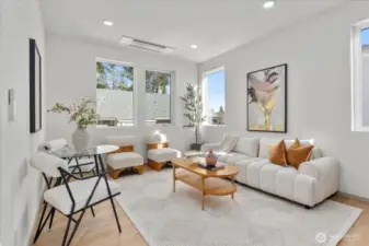 Open concept living area bathed in natural light.