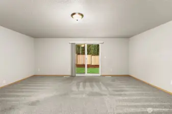 Lower-level features an oversized bonus room with access to the the back yard.